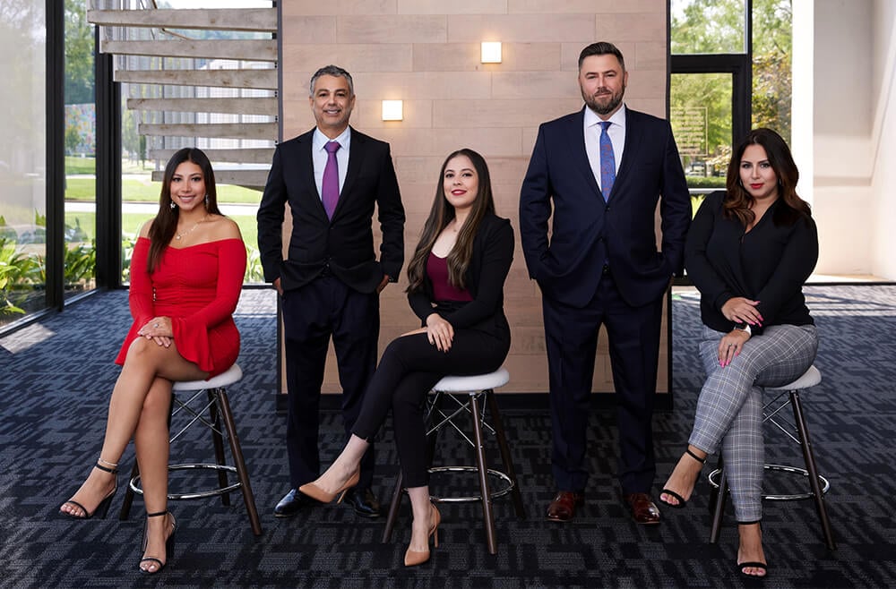 Photo of Professionals at Carlos Corless Attorneys at Law